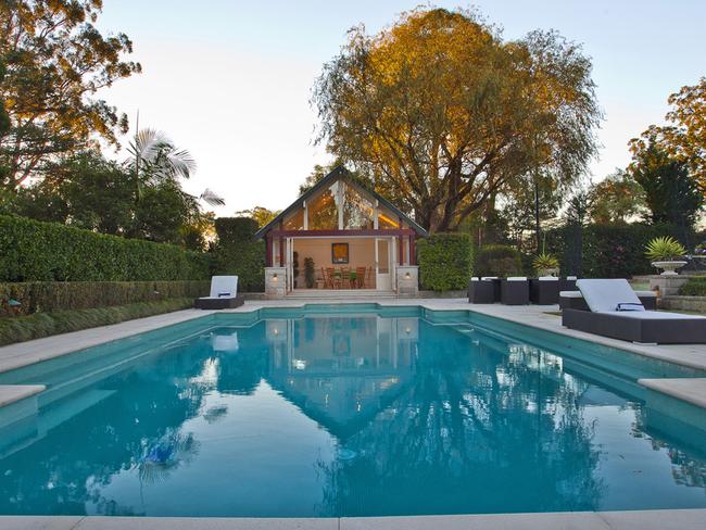 The house features a poolside cabana.