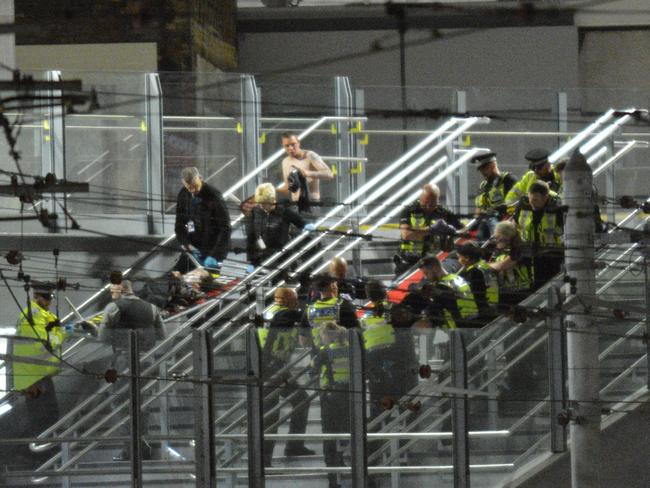 Casualties being carried out of the Manchester Arena on barriers after an explosion at the Ariana Grande gig. Picture: icelebtv