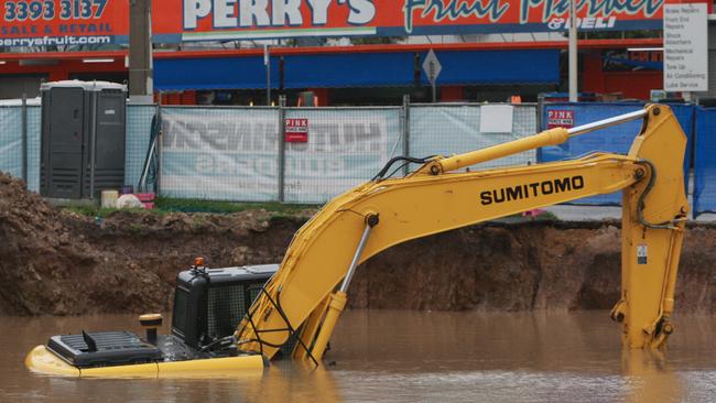 Flooding in 2010 at a site on Tingal Rd, Wynnum. Pic Jono Searle