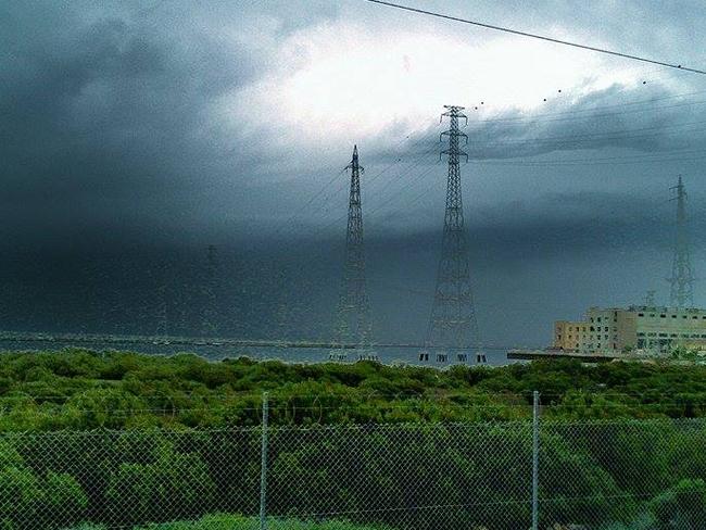 The storm system rolling over Port Augusta power station, looking very angry Wednesday. Picture: Craig Element