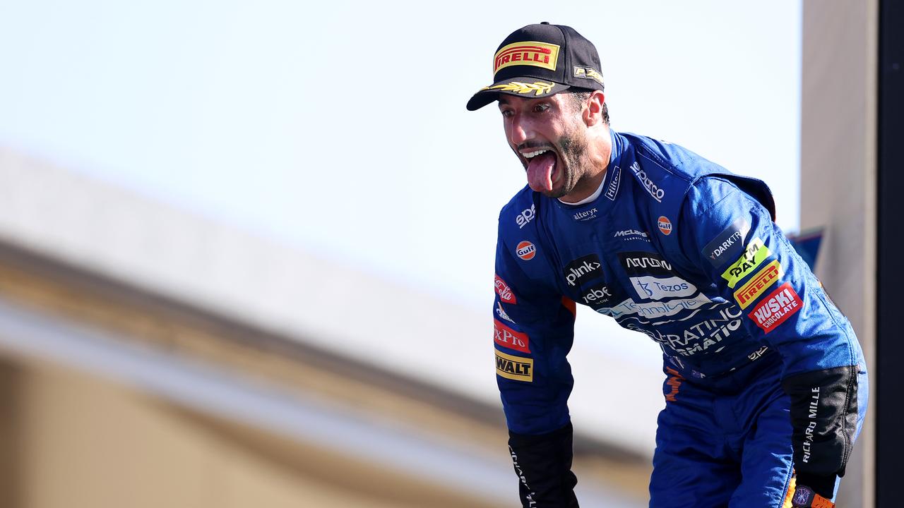 MONZA, ITALY - SEPTEMBER 12: Race winner Daniel Ricciardo of Australia and McLaren F1 celebrates on the podium during the F1 Grand Prix of Italy at Autodromo di Monza on September 12, 2021 in Monza, Italy. (Photo by Lars Baron/Getty Images)