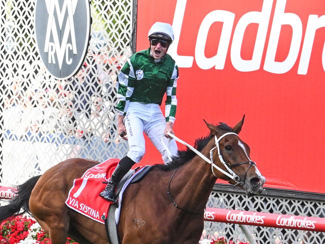 MELBOURNE, AUSTRALIA - OCTOBER 26: James McDonald riding Via Sistina winning Race 9, the Ladbrokes Cox Plate - Betting Odds during Cox Plate Day at Moonee Valley Racecourse on October 26, 2024 in Melbourne, Australia. (Photo by Vince Caligiuri/Getty Images)