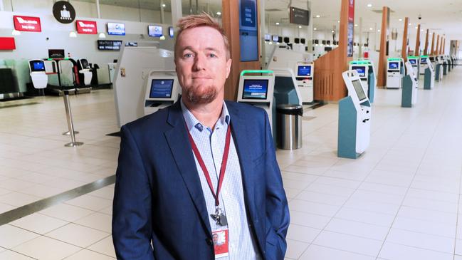 Queensland Aircorp Limited CEO Chris Mills in the deserted terminal in March last year. Picture: Scott Powick