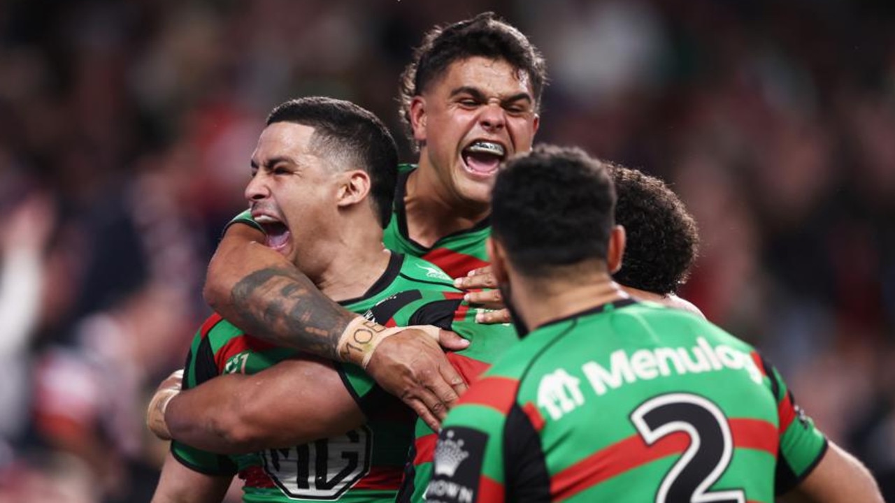 Cody Walker and Latrell Mitchell celebrate a try.