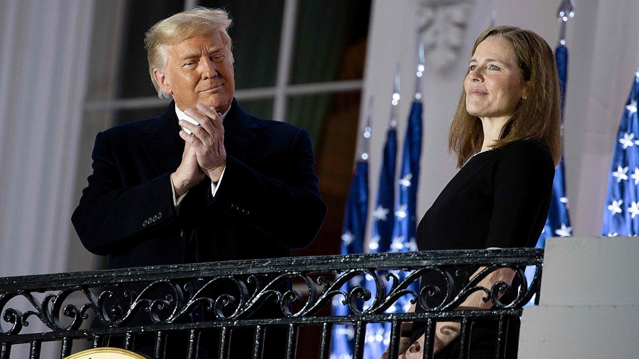 Donald Trump with newly sworn in Supreme Court Justice Amy Barrett. She was only able to be sworn in because the Republicans have control of the Senate. Picture: Tasks Katopodis / Getty images North America/AFP