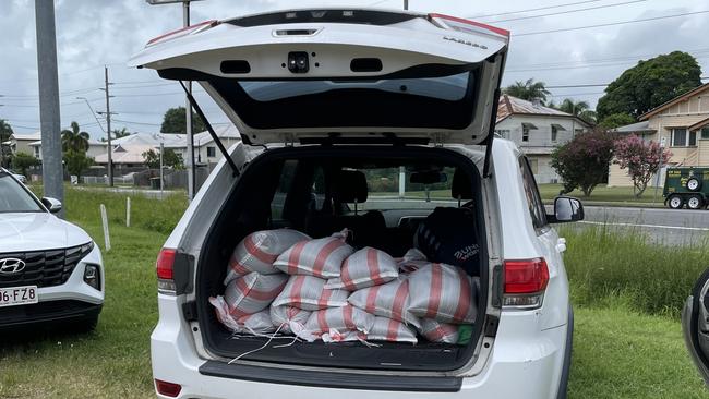 Residents and businesses alike are stocking up on sandbags ahead of Cyclone Kirrily making landfall. Photo: Fergus Gregg