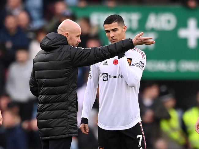 BIRMINGHAM, ENGLAND - NOVEMBER 06: Erik ten Hag speaks to Cristiano Ronaldo of Manchester United during the Premier League match between Aston Villa and Manchester United at Villa Park on November 06, 2022 in Birmingham, England. (Photo by Stu Forster/Getty Images)