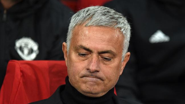 Manchester United's Portuguese manager Jose Mourinho awaits kick off in the Champions League group H football match between Manchester United and Juventus at Old Trafford in Manchester, north west England, on October 23, 2018. (Photo by Oli SCARFF / AFP)