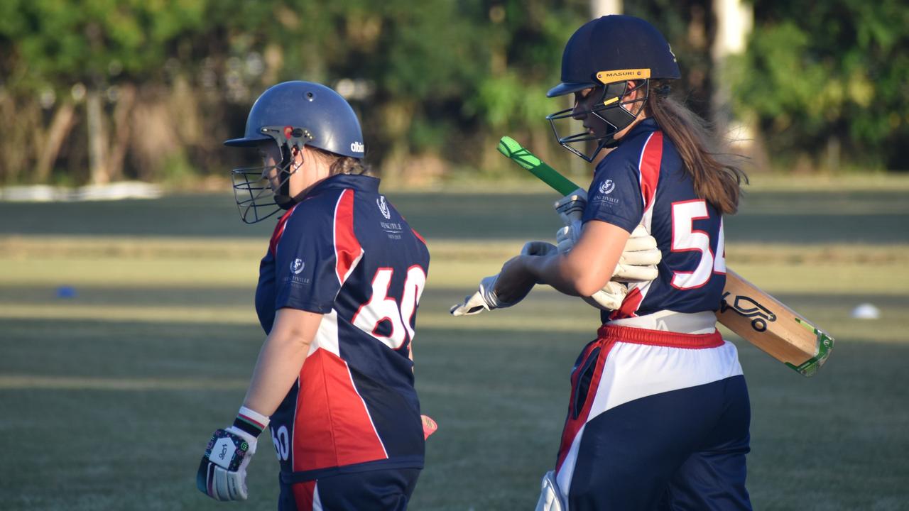 Rockhampton’s opening batters Olivia Dean and Gabby Macrae stride to the wicket.