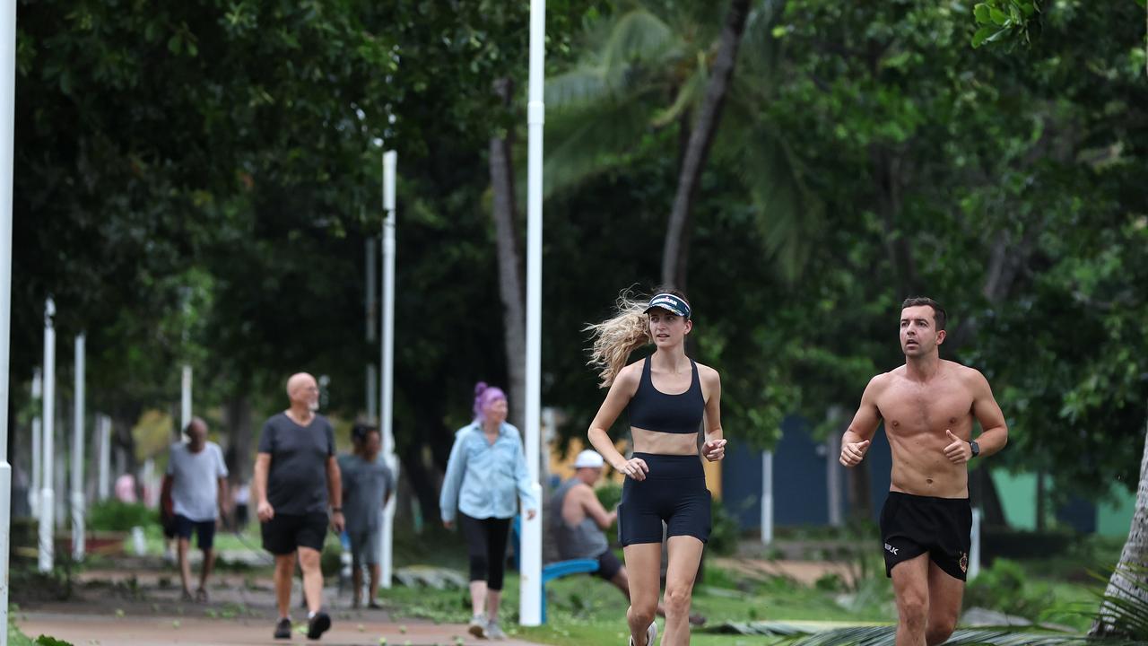 Townsville locals woke early to inspect the damage along The Strand left from TC Kirrily that hit overnight. Picture: Adam Head