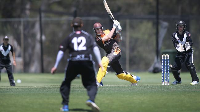 Kensington batsman David Grant skies a ball and is caught at deep mid on against Adelaide University. Picture: AAPImage/Dean Martin