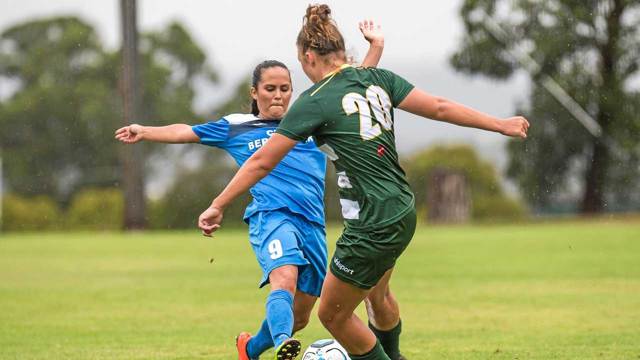 GOOD CHALLENGE: South West Queensland Thunder's Jess Fry (left) tackles her Western Pride opponent. The Thunder play Brisbane Roar at Clive Berghofer Stadium today from 2.30pm. Picture: DSL Photography