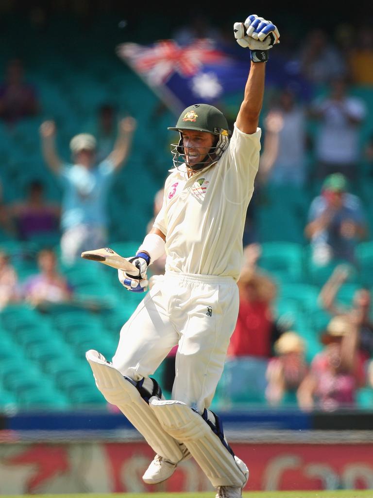 Michael Hussey of Australia celebrates scoring a century during day four against Pakistan in 2010