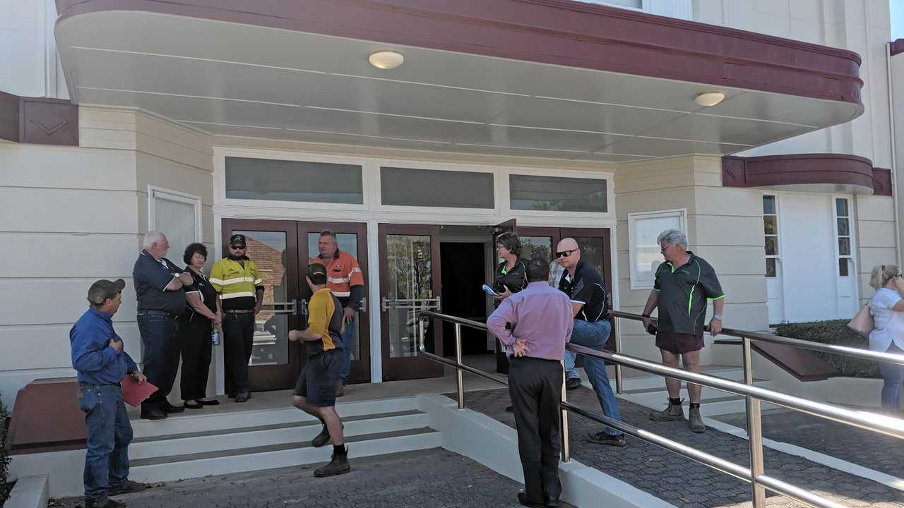 BAD NEWS: Shell-shocked creditors after the creditors meeting in Monto for Goondicum mine on September 17. Picture: Alex Treacy