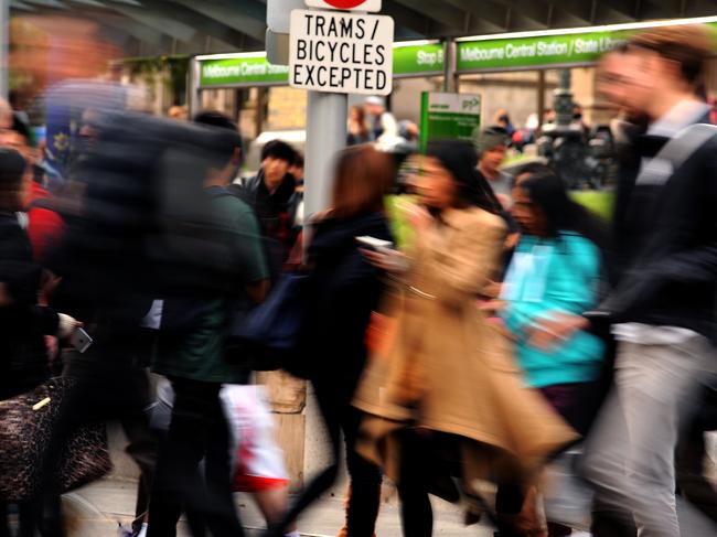 Generic photo of people in Melbourne, Tuesday, April 23, 2013. The Australian population is expected to top 23 million tomorrow. (AAP Image/Joe Castro) NO ARCHIVING