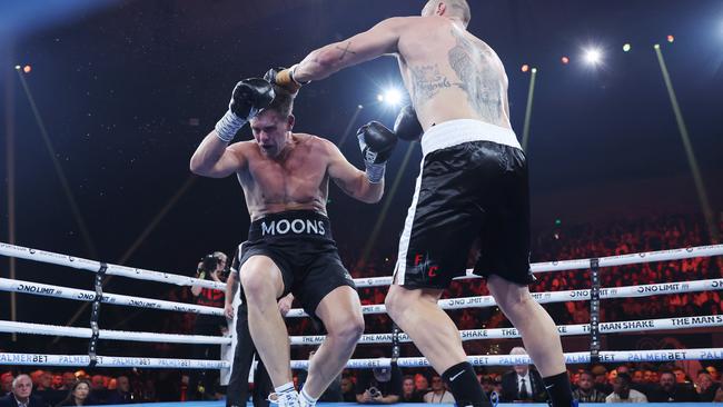 Mooney (left) went down in three rounds to former Essendon ruckman Tom Bellchambers. (Photo by Robert Cianflone/Getty Images)