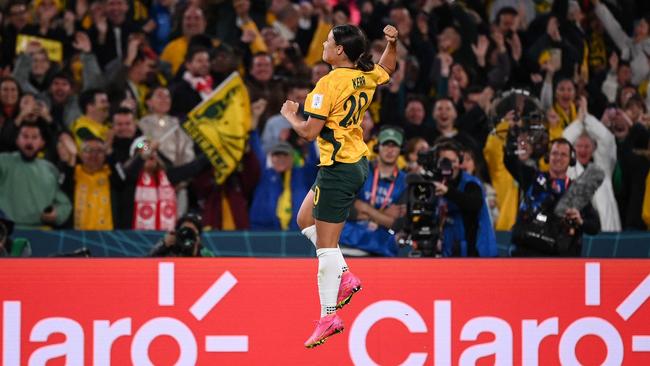 Australia's forward #20 Sam Kerr celebrates after scoring her team's first goal during the Australia and New Zealand 2023 Women's World Cup semi-final football match between Australia and England at Stadium Australia in Sydney on August 16, 2023. (Photo by FRANCK FIFE / AFP)