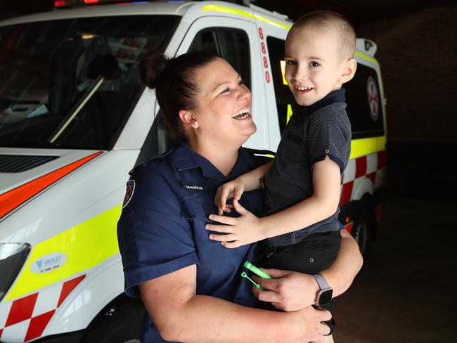 Jax with NSW paramedic Jessica Townsend. Picture: David Swift