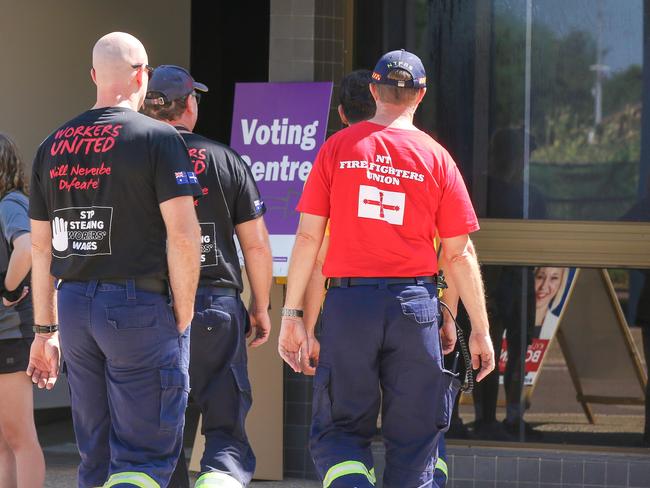 NT Firies turning out for early voting in the Darwin CBD as Polls open.Picture: Glenn Campbell