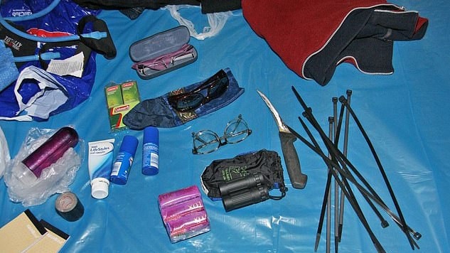 Knives, bug spray, flash lights and cable ties were among his personal items in the abandoned campsite. Picture: Queensland Police