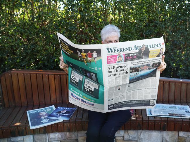 20/8/23: Person reading The Australian newspaper. John Feder/The Australian.