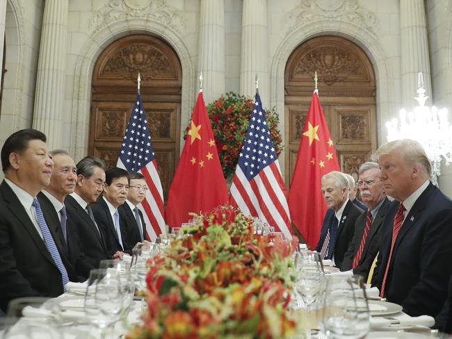 President Donald Trump, right, China's President Xi Jinping, left, and members of their delegations during their bilateral meeting at the G20 Summit, Saturday, Dec. 1, 2018 in Buenos Aires, Argentina. (AP Photo/Pablo Martinez Monsivais)