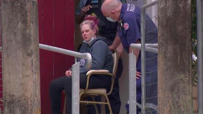 Charlise Mutten's mum, Kallista Mutten, is comforted by NSW paramedics. Picture: 9 News