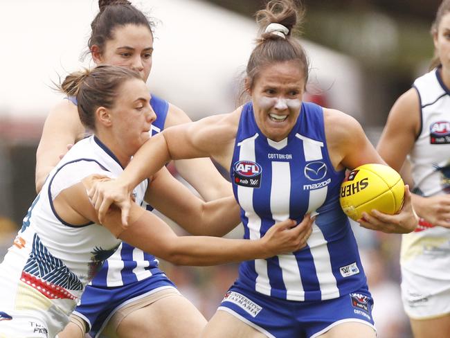 Danielle Hardiman of the Kangaroos is tackled during the Round 5 AFLW match between the North Melbourne Kangaroos and the Adelaide Crows at Avalon Airport Oval in Melbourne, Sunday, March 3, 2019. (AAP Image/Daniel Pockett) NO ARCHIVING, EDITORIAL USE ONLY