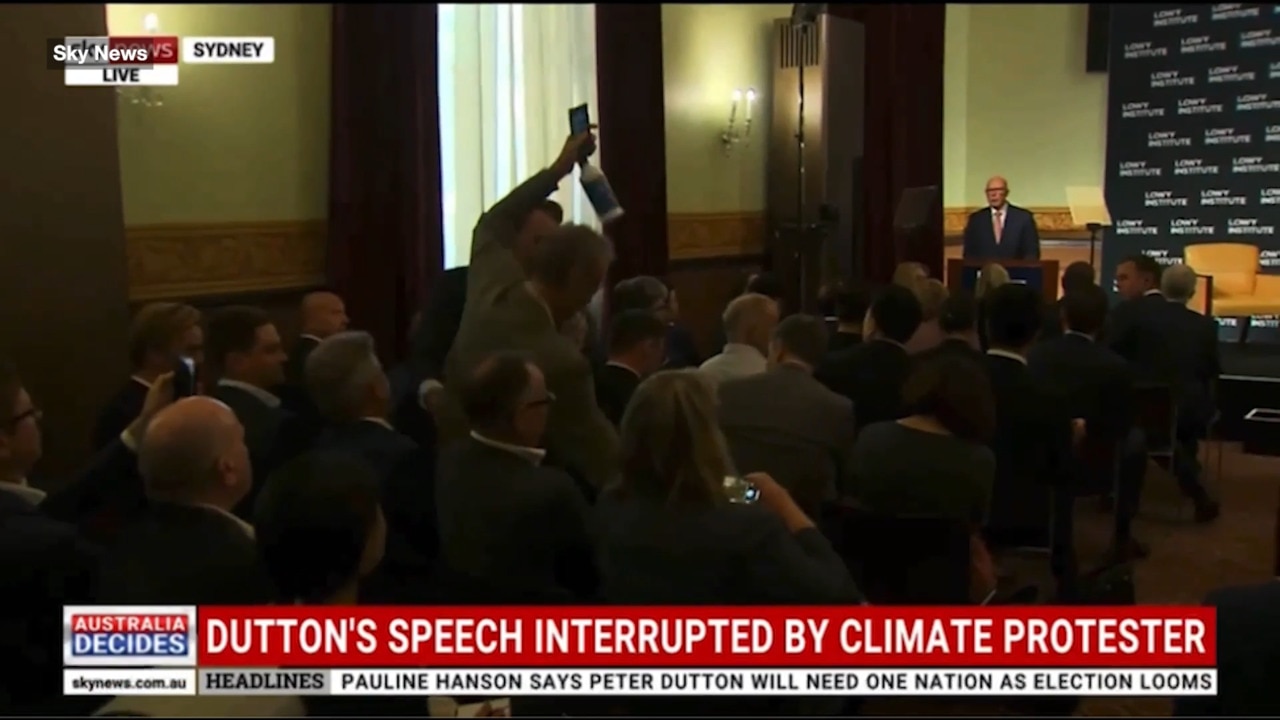 Dutton's speech interrupted by climate protester