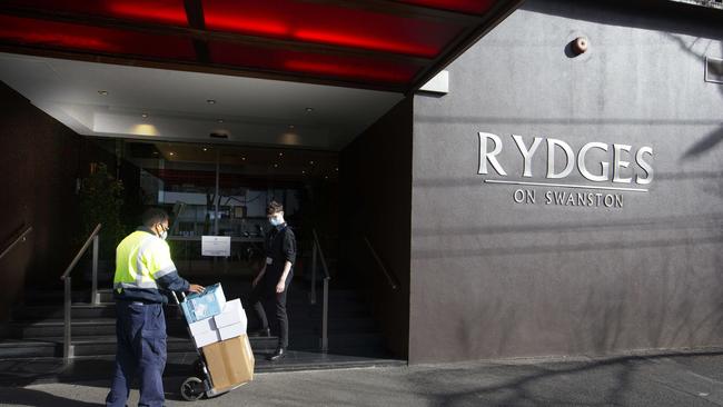 Staff at Rydges on Swanston hotel in Melbourne receive a delivery of PPE. Picture: NCA NewsWire/David Geraghty