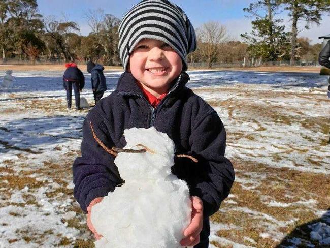 Five-year-old Myles Cook of Ebor makes the most of the snow the village received overnight. Picture: Contributed