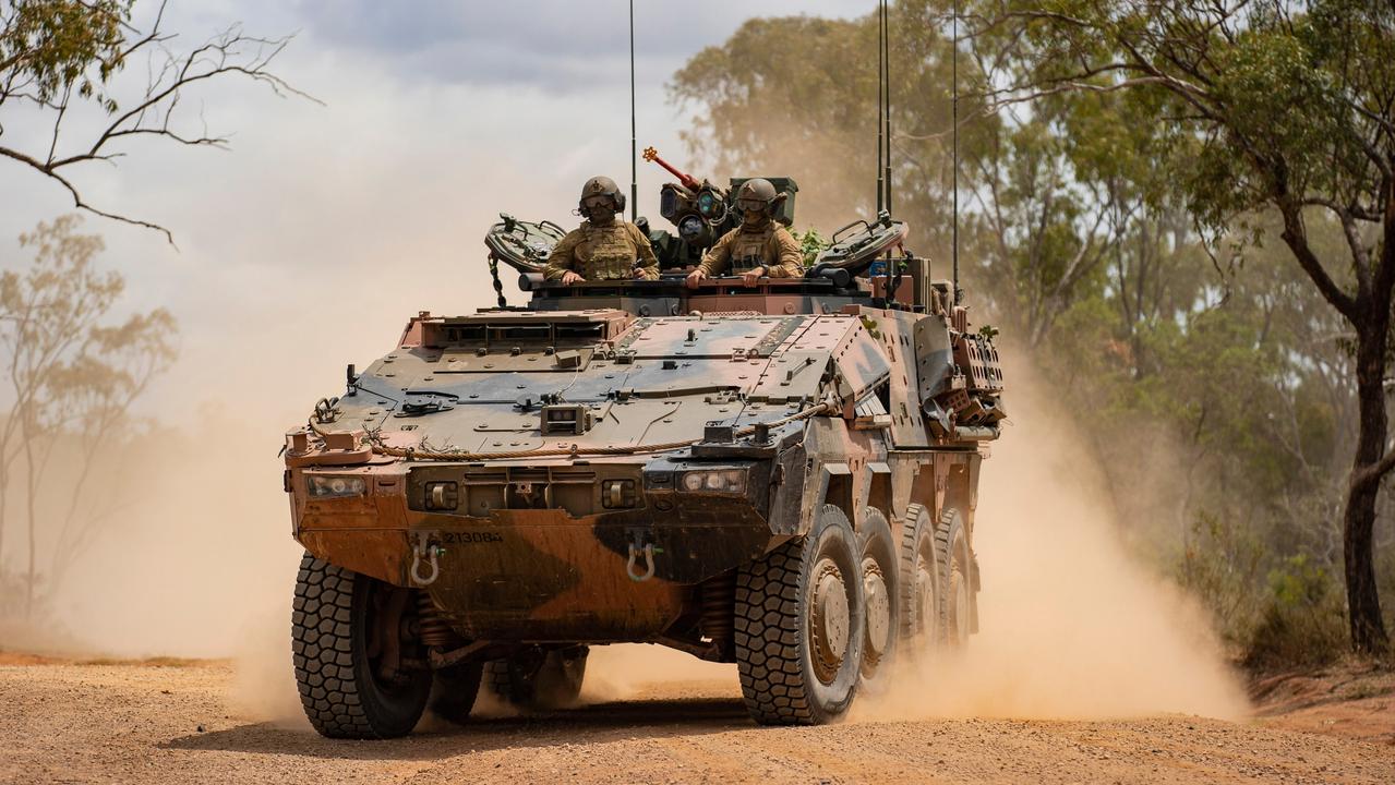 Soldiers from the 2nd/14th Light Horse Regiment (Queensland Mounted Infantry) in an Australian Army Boxer Combat Reconnaissance Vehicle conduct a battle run at Townsville Field Training Area, Queensland. Picture: Defence