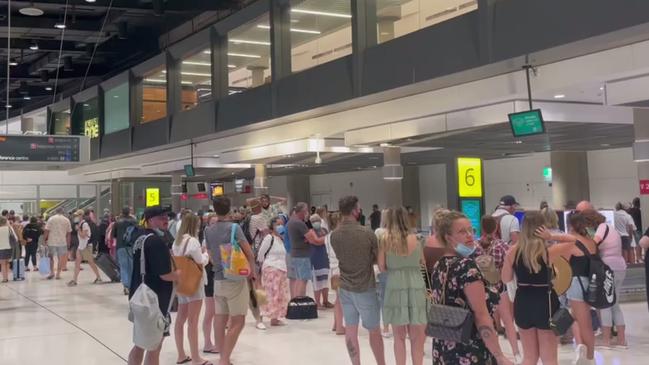 The first passengers at Brisbane Airport. Picture: Samantha Scott