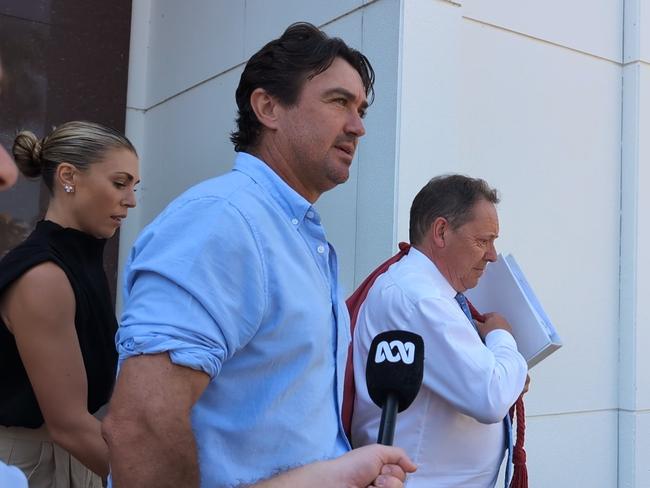 Outback Wrangler Matt Wright leaving the Supreme Court of the Northern Territory at Darwin on October 24, 2024, alongside his wife Kaia and his barrister David Edwardson. Picture: Zizi Averill