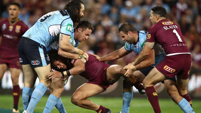 Dane Gagai is tackled during Origin 3. Photo: Getty Images