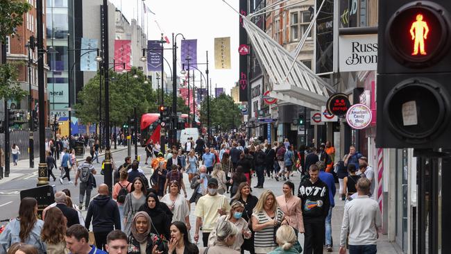 Shoppers walk along Oxford Street in London. Picture: Getty Images