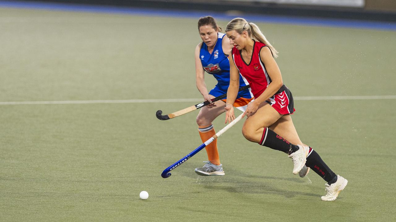 Lyndal Warrener (left) of Newtown and Savannah Trapp of Past High in A1 Women's Toowoomba Hockey grand final at Clyde Park, Saturday, September 7, 2024. Picture: Kevin Farmer