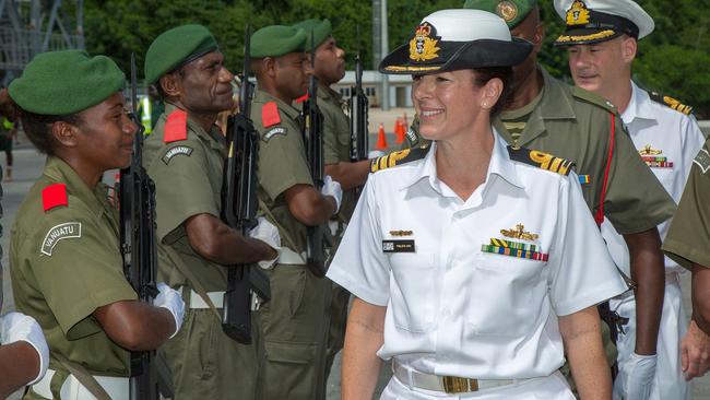 Royal Australian Navy Task Group 637 Commanding Officer Phillipa Hay inspects the Vanuatu Police Mobile Force Guard during a welcoming ceremony at Lapetasi Wharf, Port Vila, Vanuatu. Picture: Defence