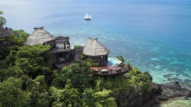 Udu residence, one of 25 villas, perches on a cliff with spectacular views.