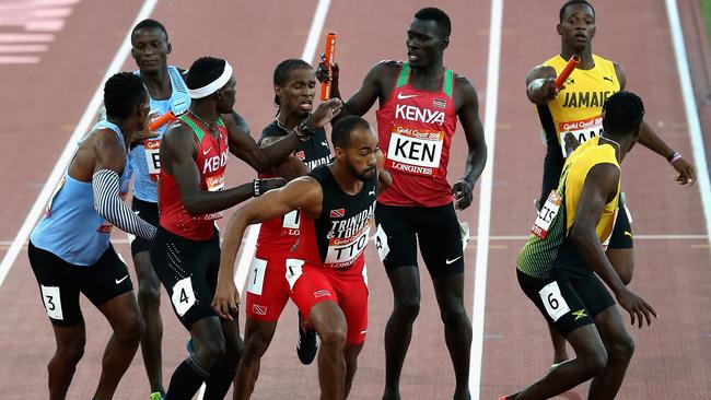 Runners tangle at the baton exchange in the Men’s 4x400m relay final at the Games last year. Picture: Alex Pantling/Getty 