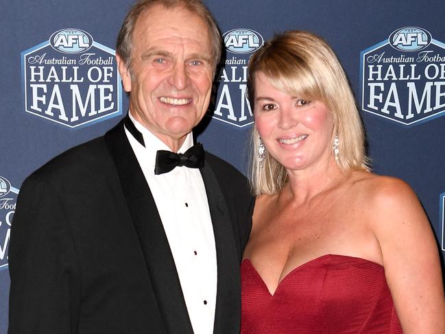 Graham Cornes with wife Nicole on the red carpet at the 2018 Australian Football Hall of Fame Induction Dinner at Crown Palladium in Melbourne, Tuesday, May 29, 2018. Six AFL greats will be inducted into the Australian Football Hall of Fame and an existing member to be elevated to legend status. (AAP Image/Joe Castro) NO ARCHIVING