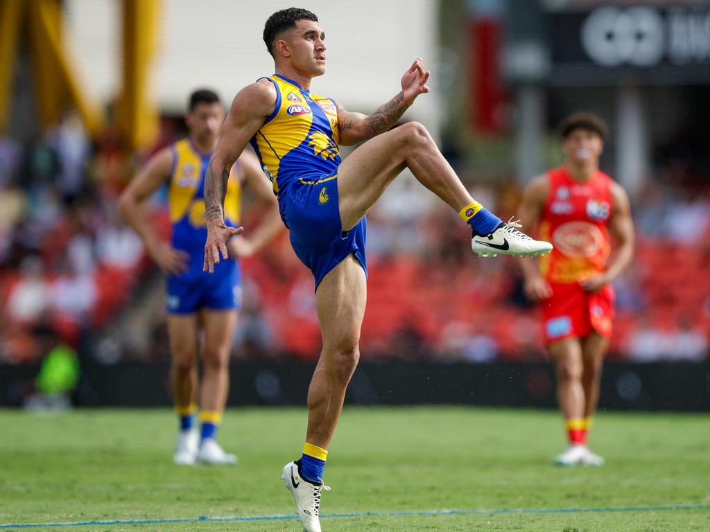 GOLD COAST, AUSTRALIA - APRIL 28: Tyler Brockman of the Eagles kicks the ball during the 2024 AFL Round 07 match between the Gold Coast SUNS and the West Coast Eagles at People First Stadium on April 28, 2024 in Gold Coast, Australia. (Photo by Russell Freeman/AFL Photos via Getty Images)