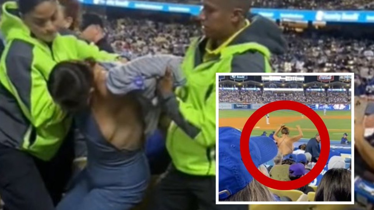 Dodgers Fan Gets Carried Out of Stadium Because Her Boobs Kept