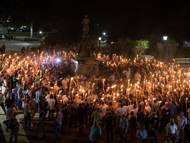 Several hundred nationalists and white supremacists carrying torches marched in a parade through the University of Virginia campus. Picture: Evelyn Hockstein/For The Washington Post via Getty Images