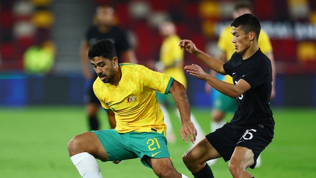 Massimo Luongo (left) has been lured out of international retirement. Picture: Bryn Lennon/Getty Images