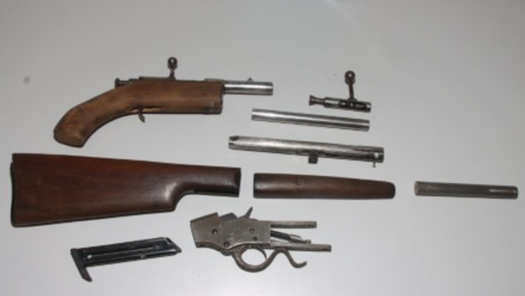 These rifle components were found during the raids.