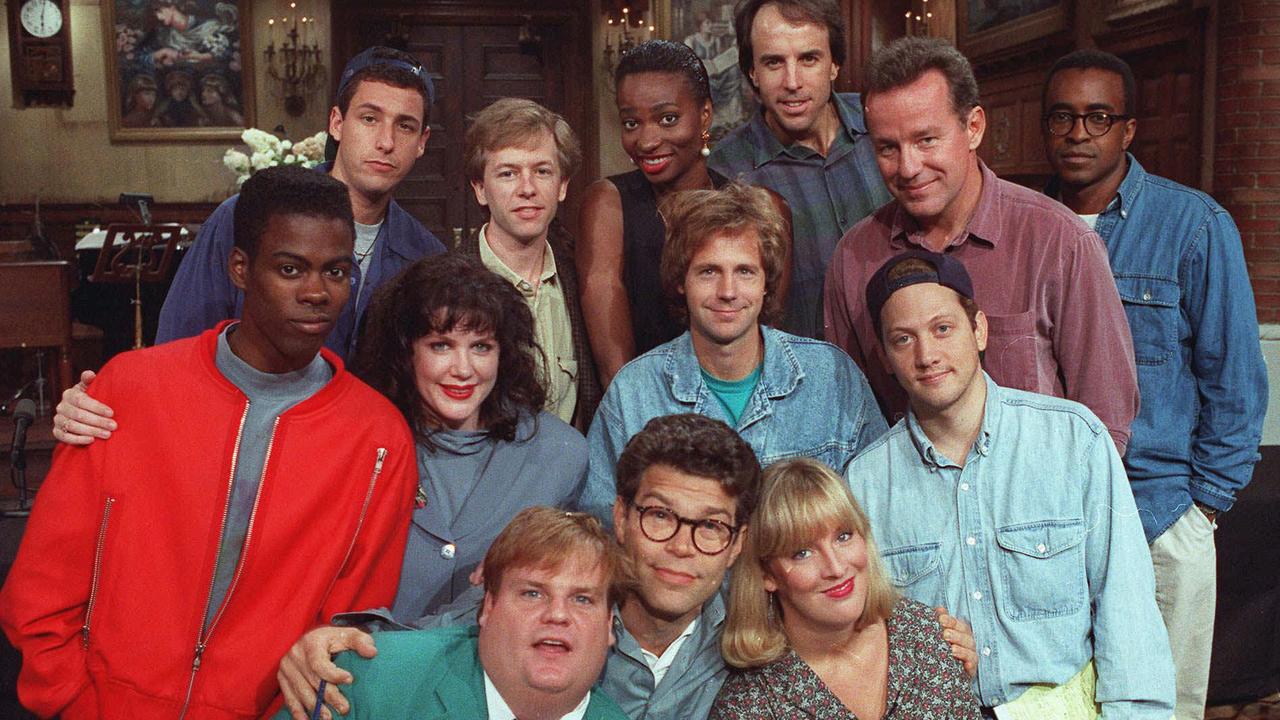 The SNL cast in 1992, including Sandler (back row, left) and Farley (front row, left).