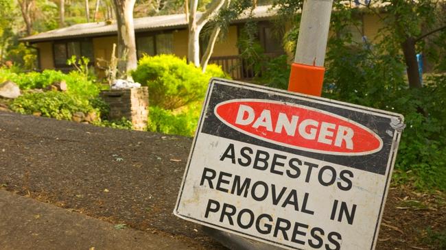 A generic asbestos removal sign outside a property containing the material. Picture: Asbestos Awareness