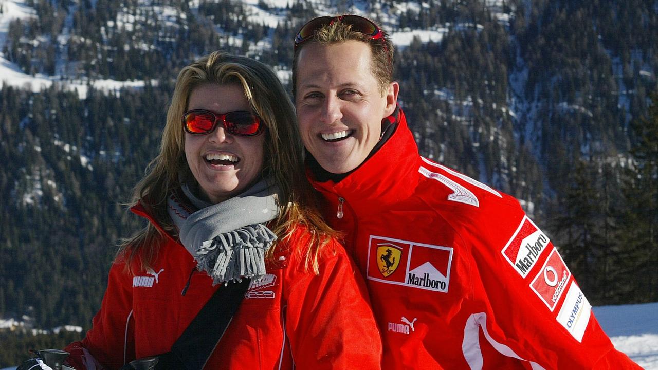 German Formula 1 driver Michael Schumacher poses with his wife Corinna. AFP PHOTO / Press Ferrari / AFP PHOTO / FERRARI PRESS OFFICE.