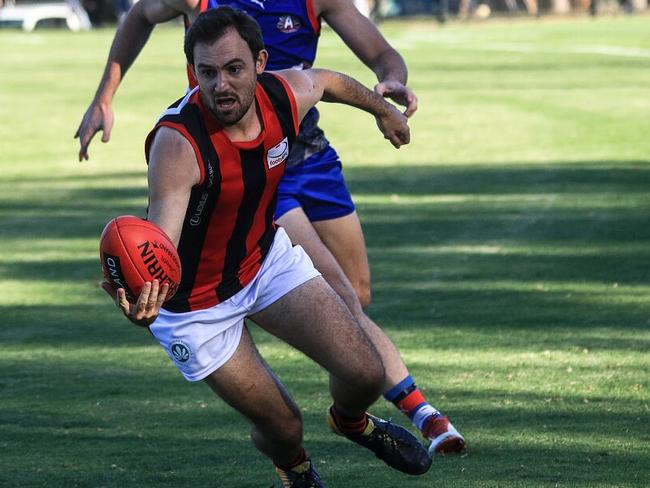 Tyler Faulkner hunts the ball in Blackburn’s win. Picture: Davis Harrigan